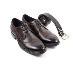 Isolated stylish leather men's dress shoes and accessories