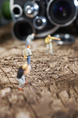 Miniature people photograpehr : shooting  a Retro, old, vintage and classic film camera
