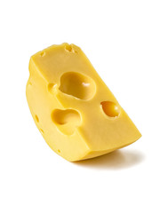 Fresh cheese from milk with big holes, isolated on white background