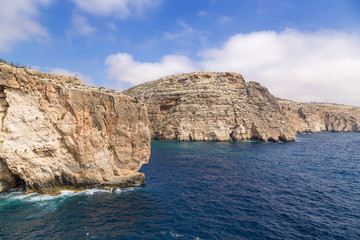 Fototapeta na wymiar Wied Iz-Zurrieq, Malta. Beautiful rocky coast in the southeast of the island