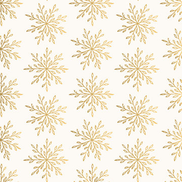 Christmas golden pattern with elegant snowflakes. Seasonal vector ornament. Foil texture.