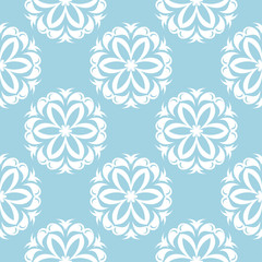 White floral seamless pattern on blue background