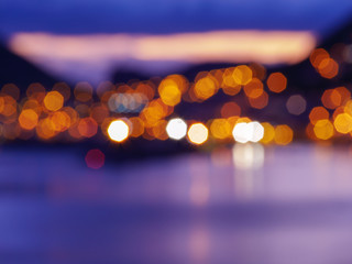 Blurry city lights during sunset. Lense flairs. flat lay