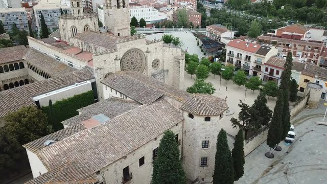 View from drone of ancient Benedictine abbey in Sant Cugat del Valles, Catalonia, Spain