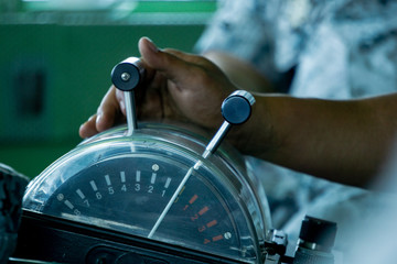 An engine order control lever, a control system to control speed of ship by controlling engines, shafts and propellers, and also control direction in forward or backward of the ship.