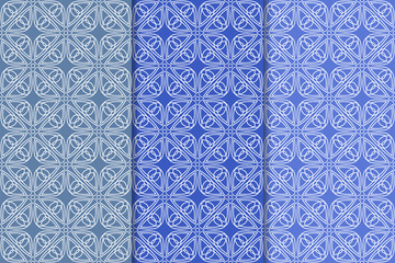 Blue geometric ornaments. Set of seamless patterns