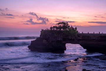 Fototapeta na wymiar Sunset at Pura Batu Bolong temple on the beatiful rock in Bali