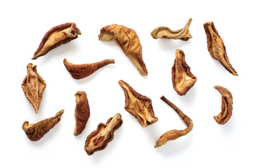 Dried pear, apple isolated on white background. Top view.