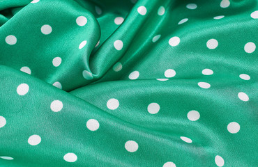 fabric silk green in white peas