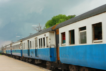 Lifestyle of People passenger travel with Rail transport in the diesel train moving at the Train station in countryside of Thailand