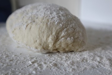 Fototapeta na wymiar Bread Dough Proofing on Kitchen Bench