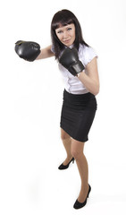 Business woman in boxing gloves