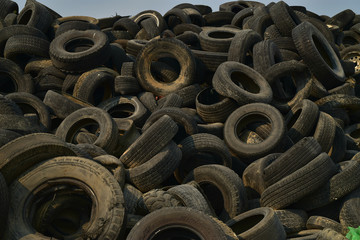 pile of worn out tire in desert landfill in Mojave Desert town of Pahrump, Nevada, USA