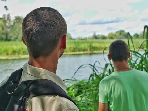 olonne / Ukraine - 06 August 2018: the guys are looking at the landscape