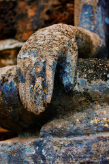 Gold hand of Buddha statue at Wat Sri Chum temple is ancient of world heritage Sukhothai Historical Park, Sukhothai province, Thailand