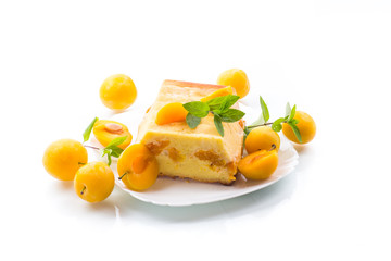 sweet curd casserole stuffed with yellow plums inside