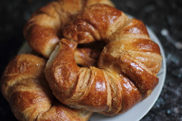 croissant on a plate, morning food 