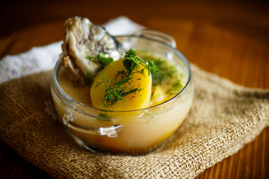 vegetable soup with fish in a glass bowl