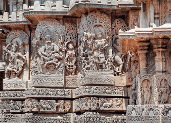 Fragment of stone carved relief with Kali, Narasimha and other Hindu gods. 12th century South...