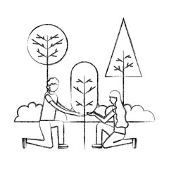 man and woman planting tree gardening