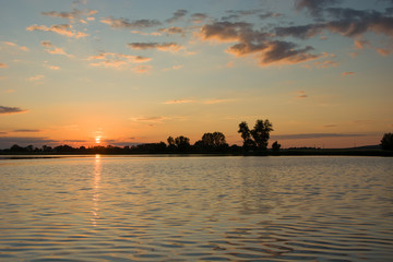 Sunset and clouds on the lake