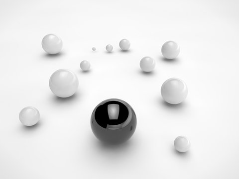 Large black ball and white balls randomly scattered on the surface of a sphere of different sizes. The idea of disorder and chaos. Abstraction, picture isolated on white background. 3D redering.