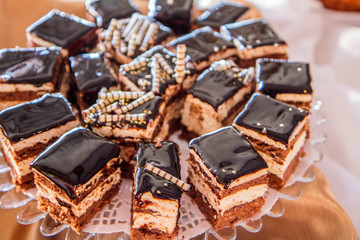 Chocolate cake set up on cake stand for a party