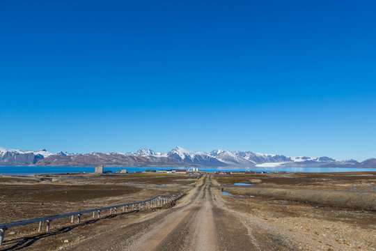 street to Ny Alesund town, Svalbard, Spitsbergen, blue sky
