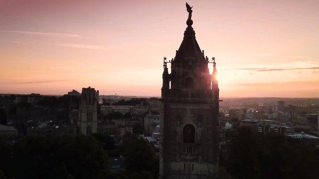 Aerial drone shot of Bristol showing Cabot Tower at sunrise