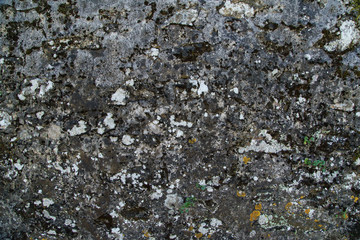 Stone wall with white stains