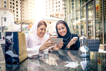 Two arabian girlfriends bonding and having fun