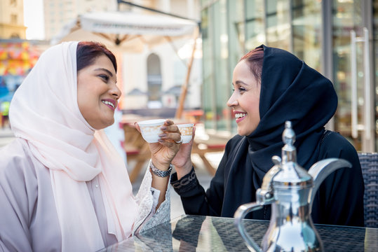 Two arabian girlfriends bonding and having fun