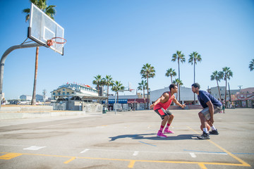 Friends playing basketball