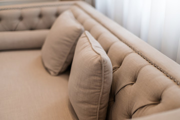 Fototapeta na wymiar closeup of nice beautiful cozy pillow of luxury sofa house concept