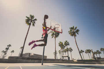 Baketball player making a dunk