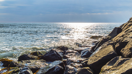 Picturesque stony coast of the big natural lake