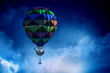 Man traveling in aerostat . Mixed media