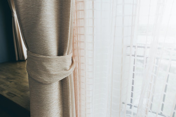soft brown curtain with morning light from window bedroom background
