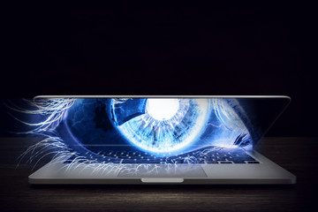 Female eye from laptop
