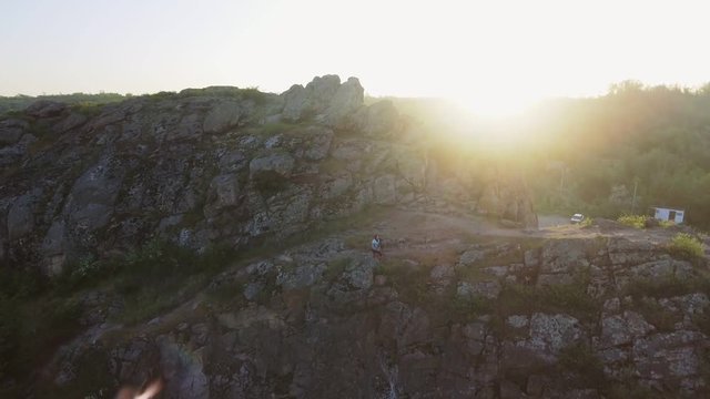 woman photographer taking photos in mountains