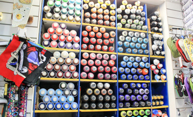 the interior of the shop of paint for graffiti colorful