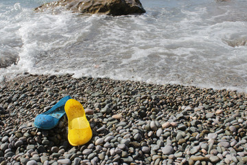 shoes on the beach. Ukraine, blue and yellow