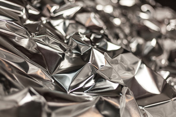 Full frame take of a sheeT of crumpled silver aluminum foil