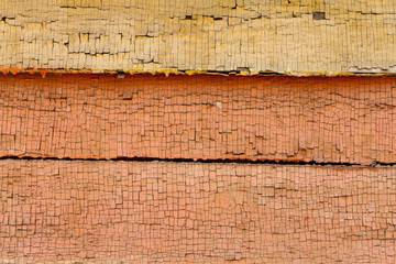colorfull old painted horizontal wooden plank with crack and scratches background