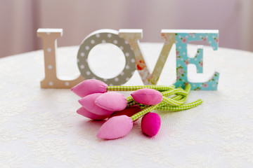 Wooden letters forming word LOVE