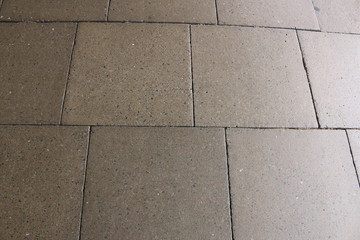 1950's brown paving slabs. 1950's paving slabs from a pavement in a city center in England.