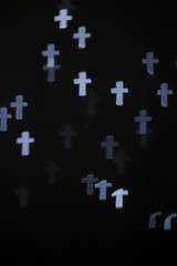 Naklejka premium Blurry blue cross light bokeh background
