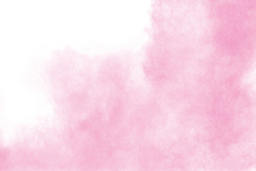 Pink powder explosion isolated on white background.