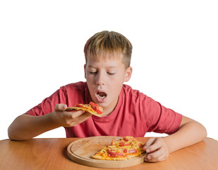 teen eating pizza