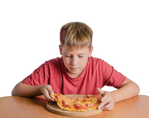 teen eating pizza